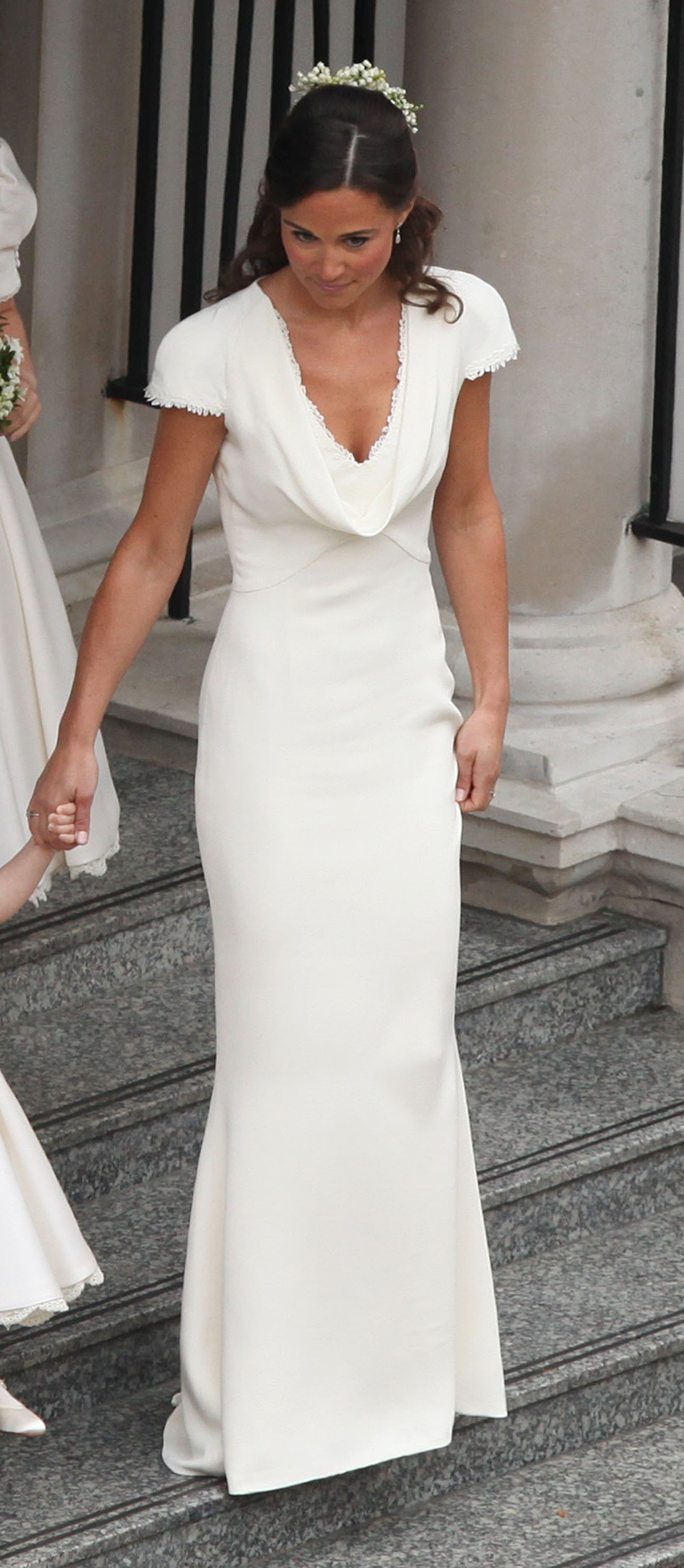 Pippa Middleton, radiante, presume de embarazo en la boda de Harry y Meghan Markle