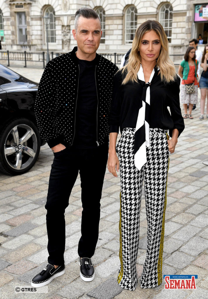 Singer Robbie Williams and Ayda Field attending the X Factor photocall in London. *** Local Caption *** .