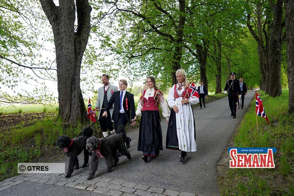 Norway's Crown Prince Haakon, Crown Prince Mette Marit, Princess Ingrid Alexandra and Prince Sverre Magnus walk outside their home during the Norwegian Constitution Day, due to the coronavirus disease (COVID-19) outbreak, in Asker, Norway  May 17, 2020.