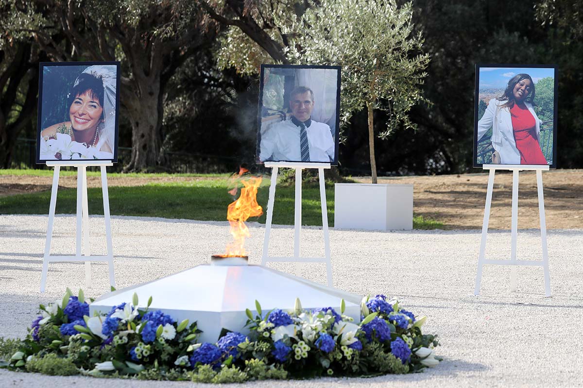 Portraits of Nadine Devillers, Vincent Loques and Simone Barreto Silva, the victims of a deadly knife attack on October 29, 2020, are displayed during a ceremony in Nice, France November 7, 2020.