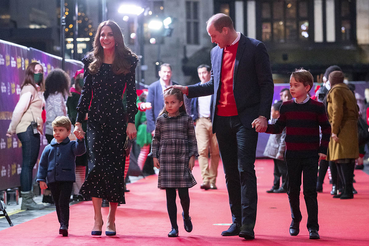 Prince William and Kate Middleton and their children, Prince Louis, Princess Charlotte and Prince George attend a special pantomime performance at London's PalladiumTheatre