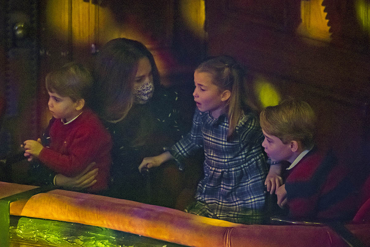 Kate Middleton and their children, Prince Louis, Princess Charlotte and Prince George attend a special pantomime performance at London's PalladiumTheatre