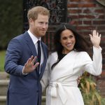 FILE - Britain's Prince Harry and his fiancee Meghan Markle pose for photographers during a photocall in the grounds of Kensington Palace in London, Monday Nov. 27, 2017. The second baby for the Duke and Duchess of Sussex is officially here: Meghan gave birth to a healthy girl on Friday, June 4, 2021.