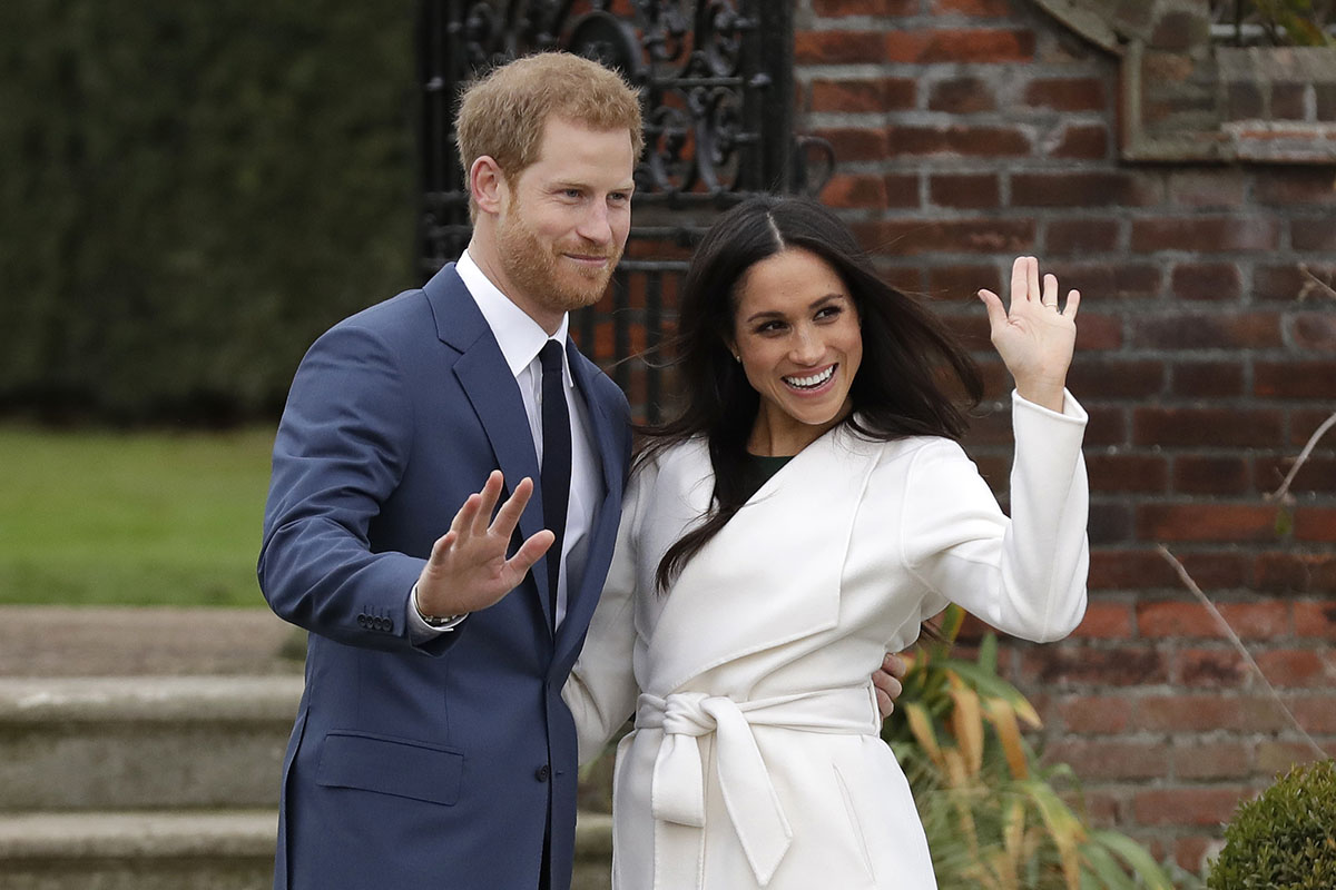 FILE - Britain's Prince Harry and his fiancee Meghan Markle pose for photographers during a photocall in the grounds of Kensington Palace in London, Monday Nov. 27, 2017. The second baby for the Duke and Duchess of Sussex is officially here: Meghan gave birth to a healthy girl on Friday, June 4, 2021.