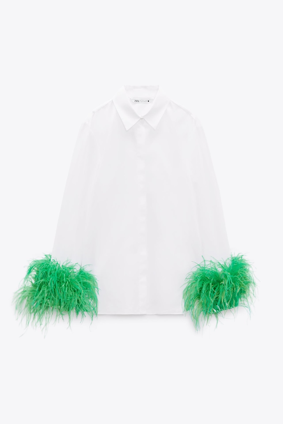 Camisa plumas en los puños de Zara