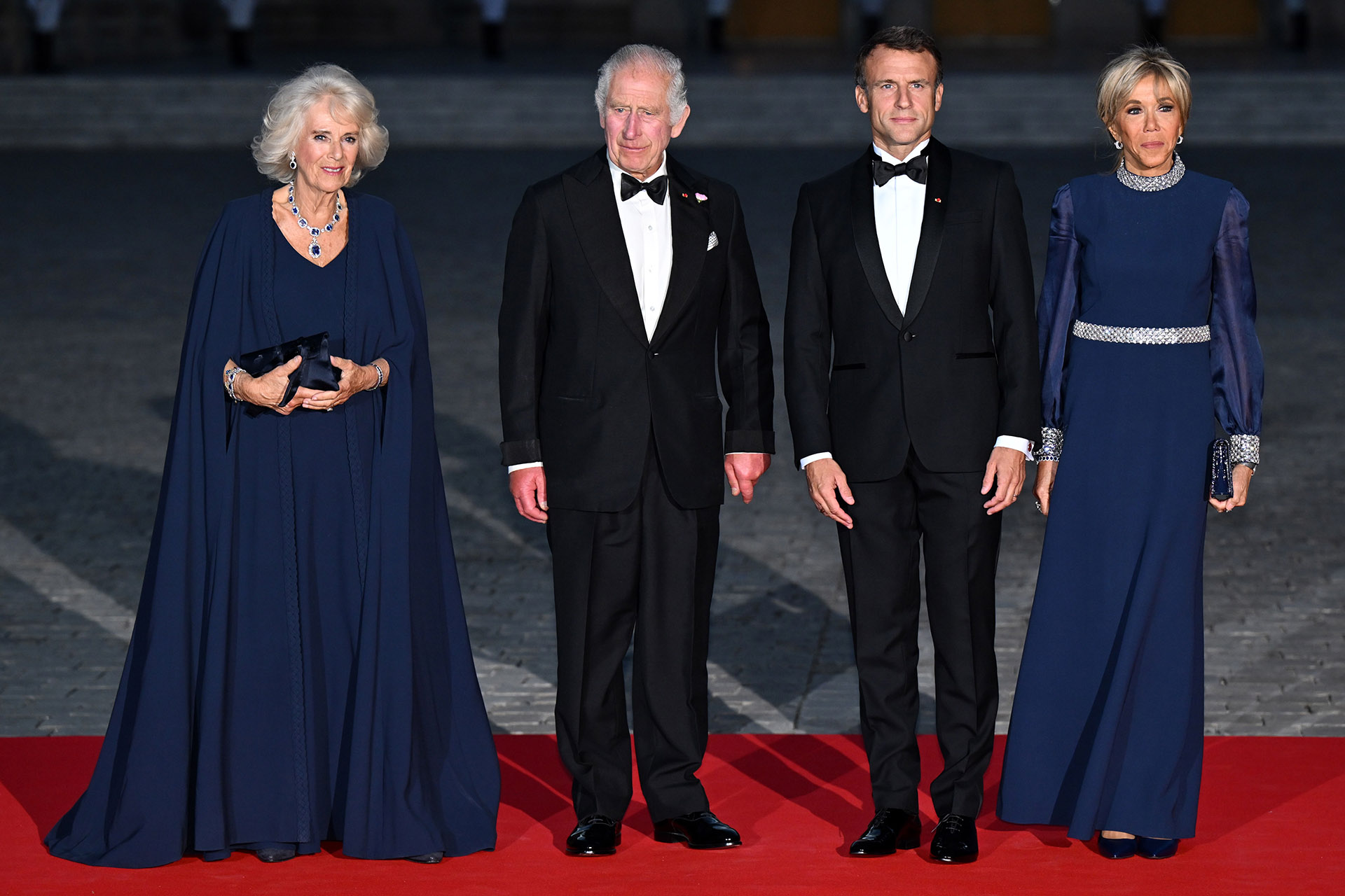 Carlos III, Camilla Parker, Emmanuel y Brigitte Macron en el Palacio de Versalles.