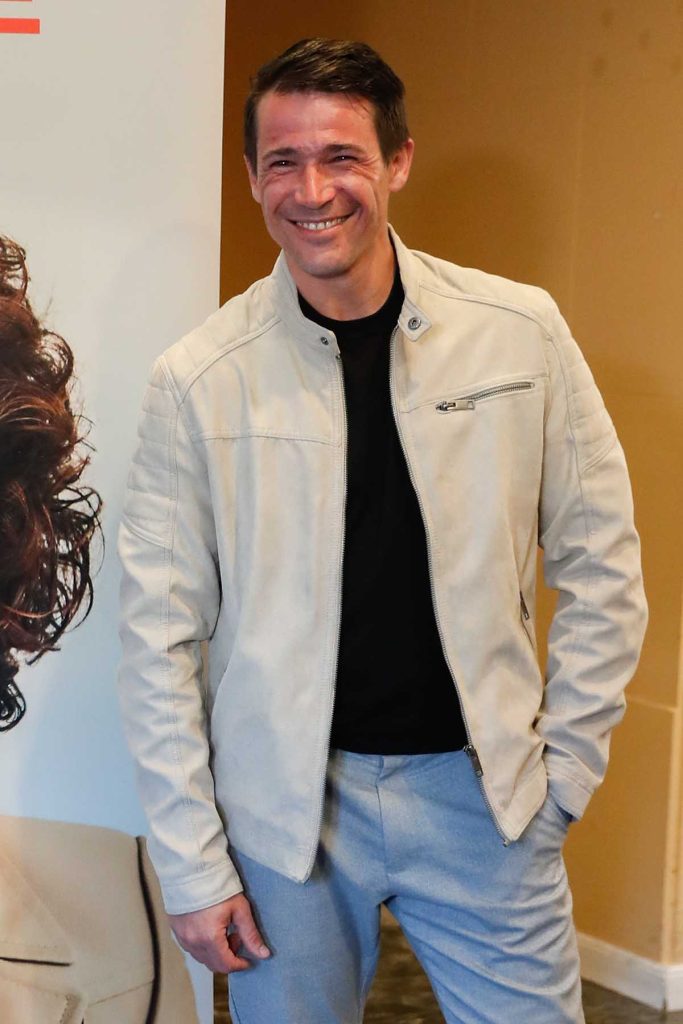 El actor Juan José Ballesta posa sonriente durante un photocall