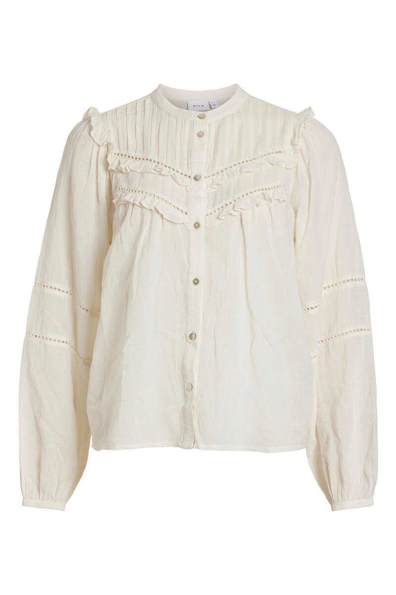 Esta blusa romántica con aires vintage es perfecta para lucir el estilo 'coquette'