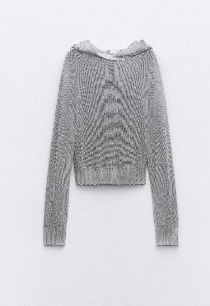 Esta sudadera de punto y malla metalizada de Zara pide a gritos ser la prenda principal en nuestros looks más fiesteros