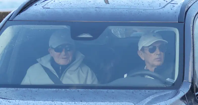 Juan Carlos I y Pedro Campos en un coche