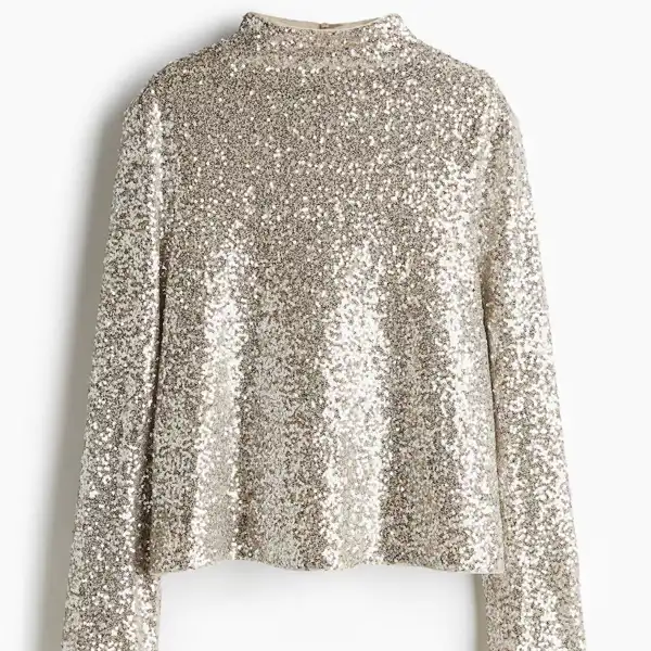 H&M, Sequined turtleneck top con lentejuelas