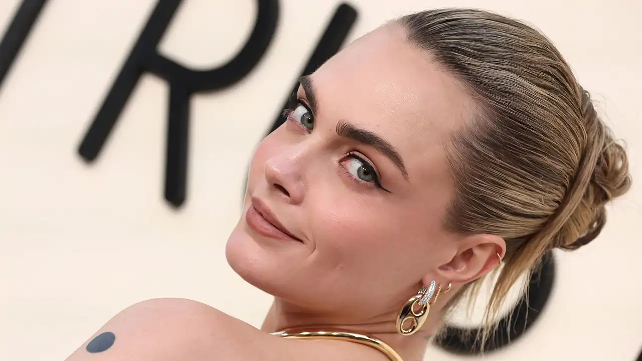 Cara Delevingne en un photocall