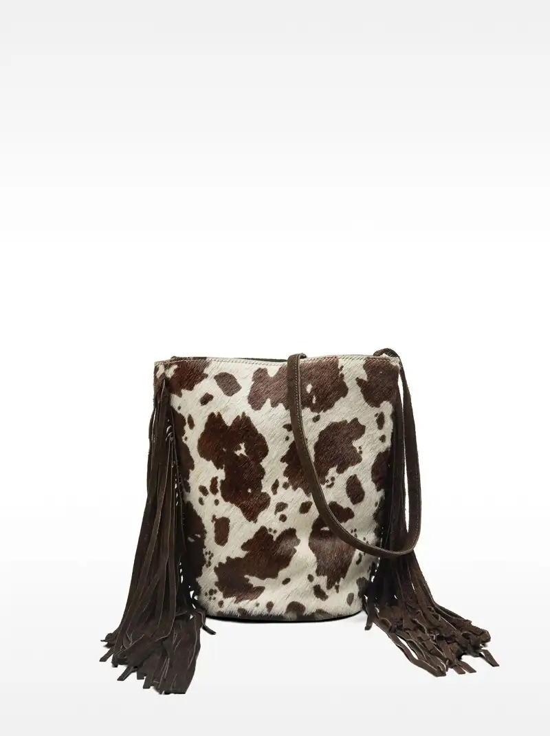 Bolso bombonera de piel con flecos de Parfois 49,99 euros 