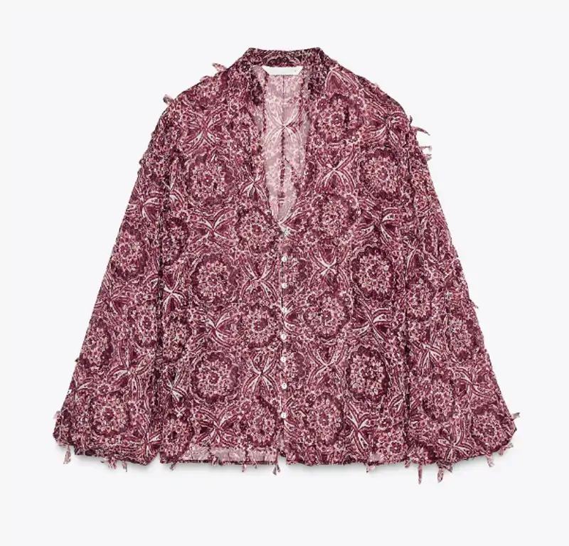 blusa estampada flecos